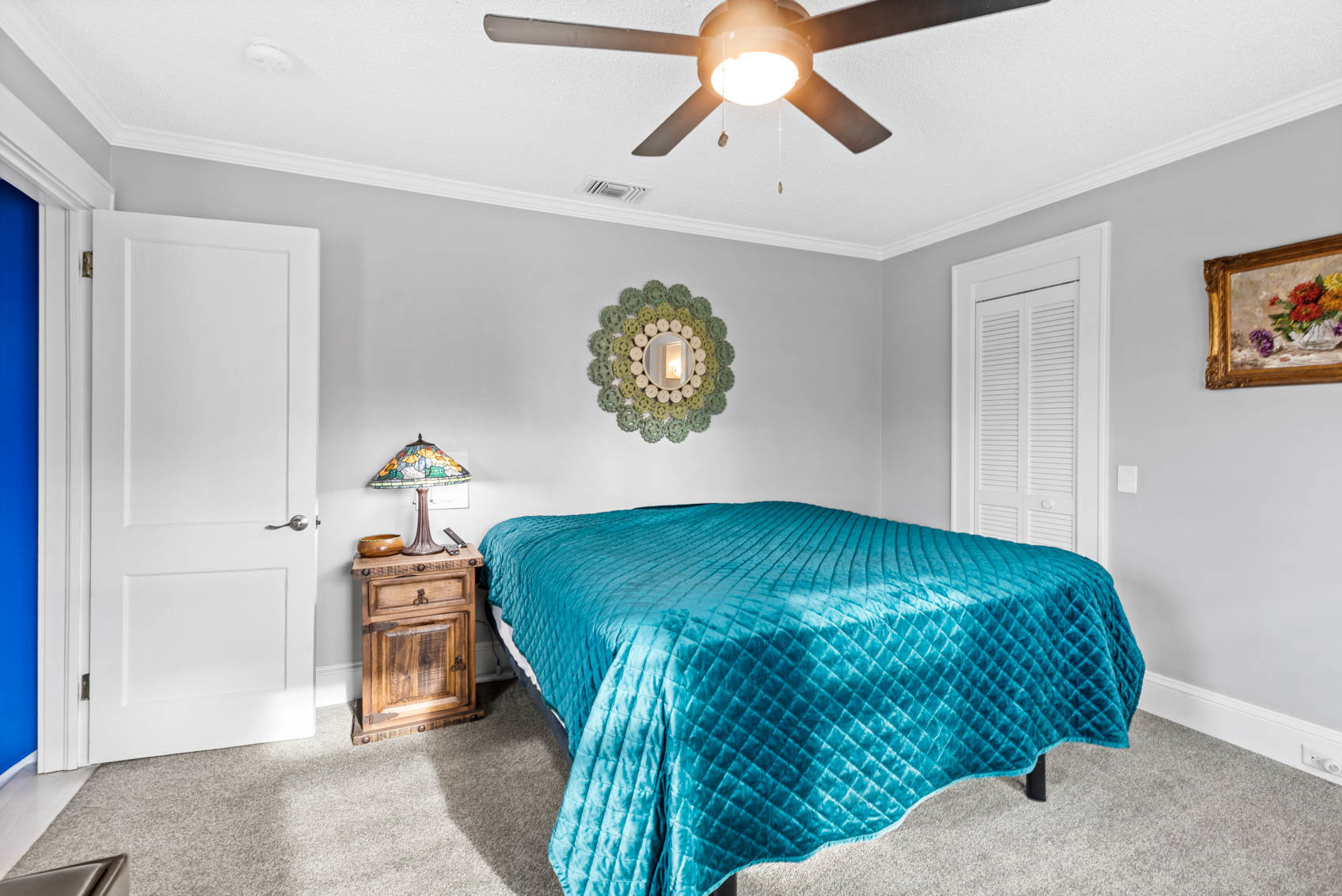 bedroom with grey walls and furniture